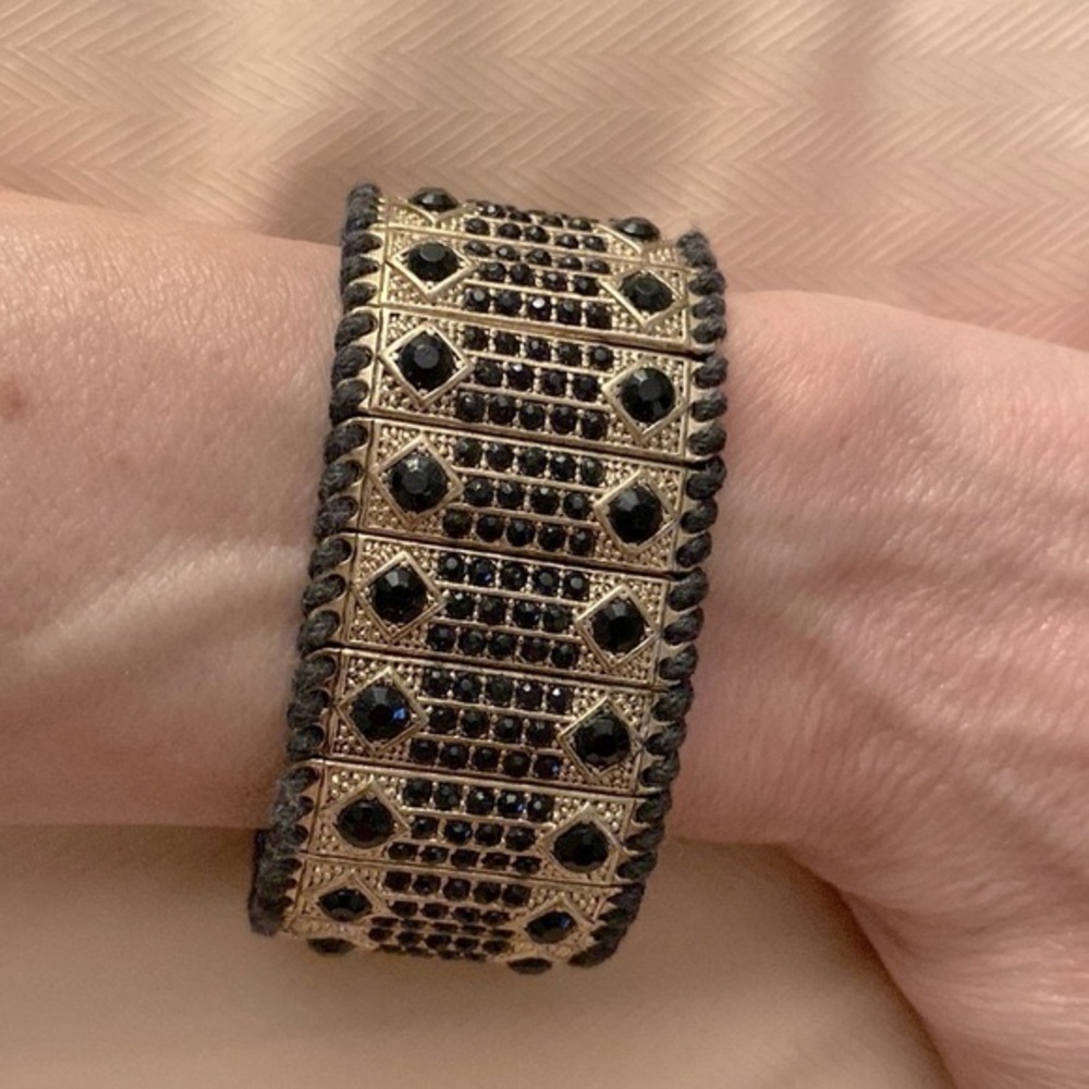 Heavy Stretch Bracelet W/ Black Rhinestones in An Antique Gold
Plating